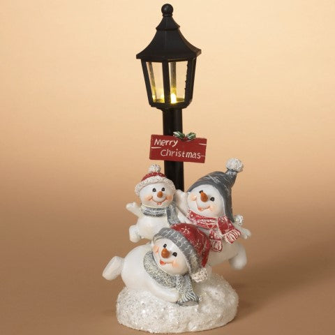 Snowman Family with Lamp