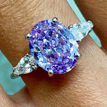 Oval 3-Stone Solitaire Ring
