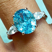 Oval 3-Stone Solitaire Ring