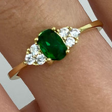 Oval Emerald with Side Cubic Zirconia Stones Ring