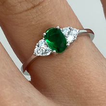 Oval Emerald with Side Cubic Zirconia Stones Ring