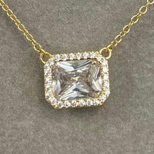 Inset Emerald Cut Halo Necklace