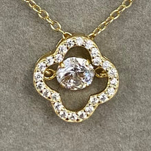 Pave Quatrefoil with Dancing Cubic Zirconia Necklace