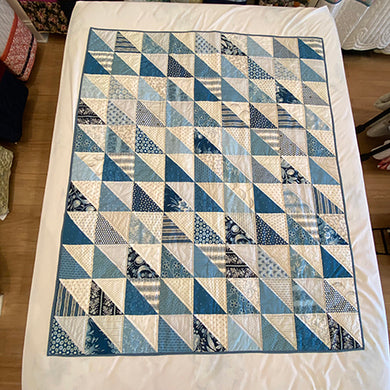 Charming Triangles Throw Quilt