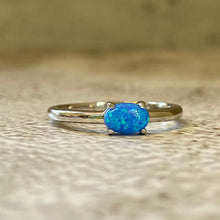 Blue Opal Oval Solitaire Ring