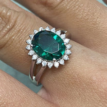 Oval Stone Sunburst Halo Ring
