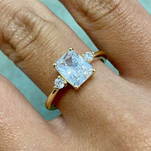 Emerald Cut with 2 Round Cubic Zirconia Ring