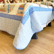 Curvy Log Cabin Queen Quilt