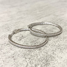 Cubic Zirconia Hinged Oval Hoop Earrings